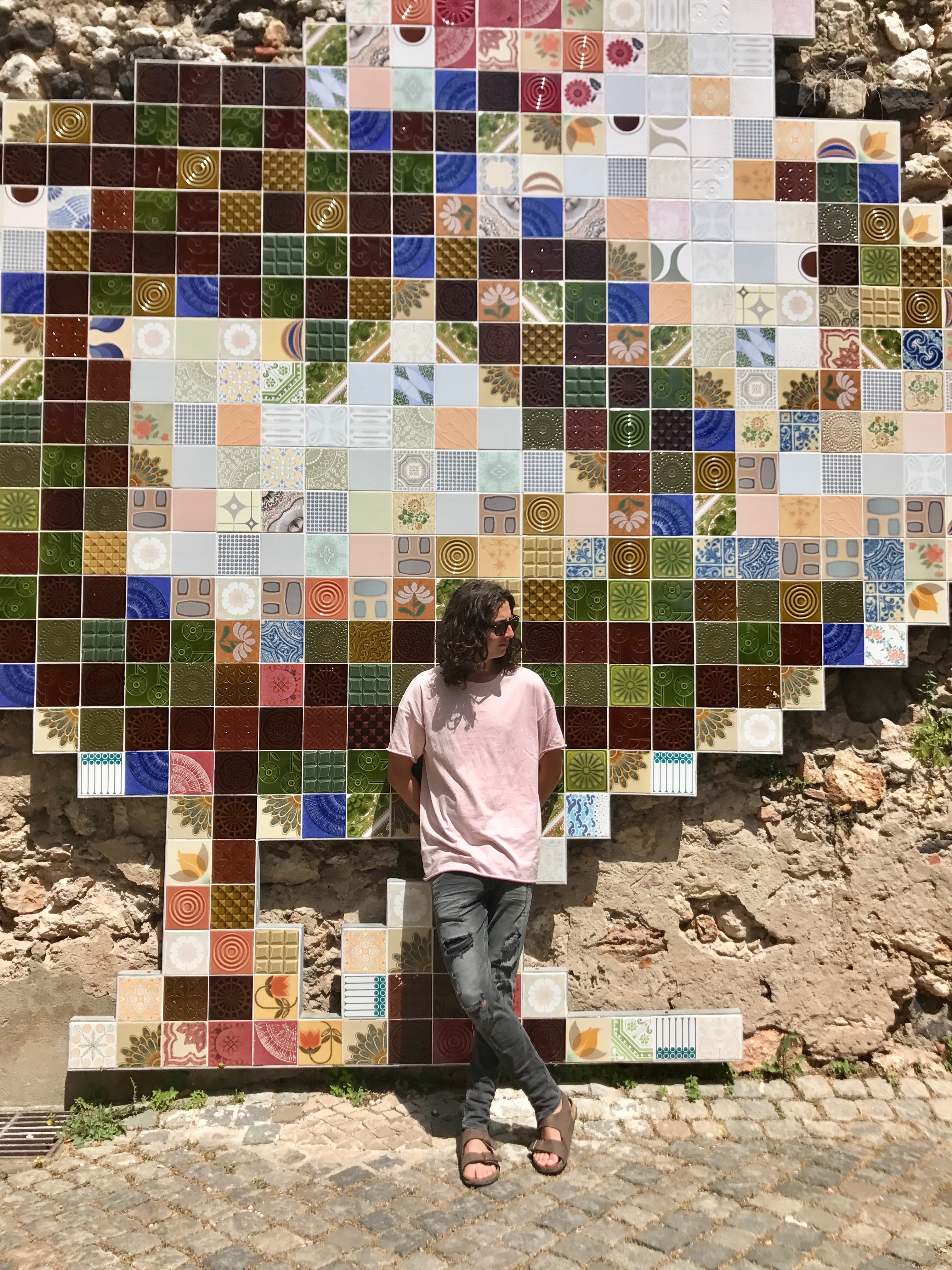 Picture of Ballard Blair in Portugal with colorful tiles